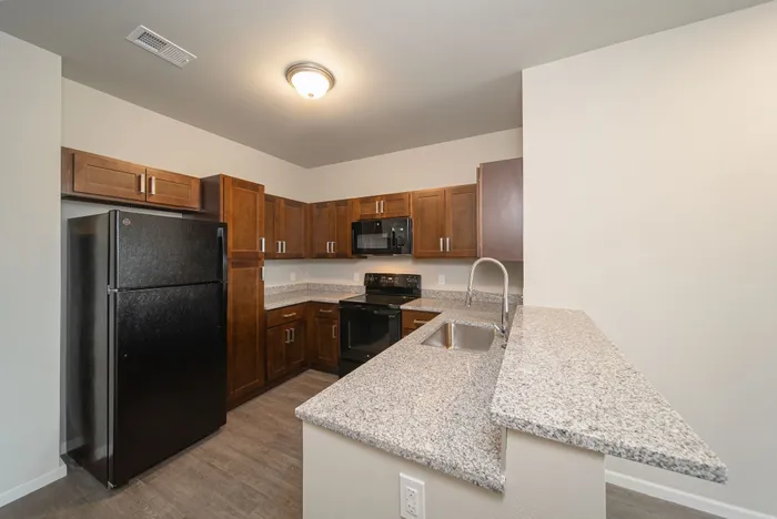 Crescent-Falls-Apartments-Joplin-Missouri-One-Bedroom-Kitchen-Breakfast-Bar