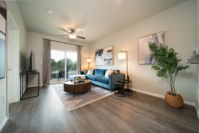 Crescent-Falls-Apartments-Joplin-Missouri-Furnished-One-Bedroom-Living-Room-Balcony