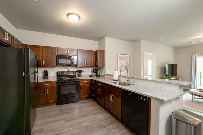 Crescent-Falls-Apartments-Joplin-Missouri-Furnished-Two-Bedroom-AirBNB-Kitchen-Living-Room