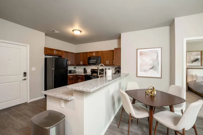 Crescent-Falls-Apartments-Joplin-Missouri-Furnished-Two-Bedroom-AirBNB-Kitchen-Dining-Table