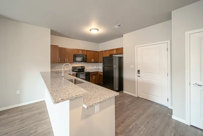 Crescent-Falls-Apartments-Joplin-Missouri-Two-Bedroom-Kitchen-Front-Door
