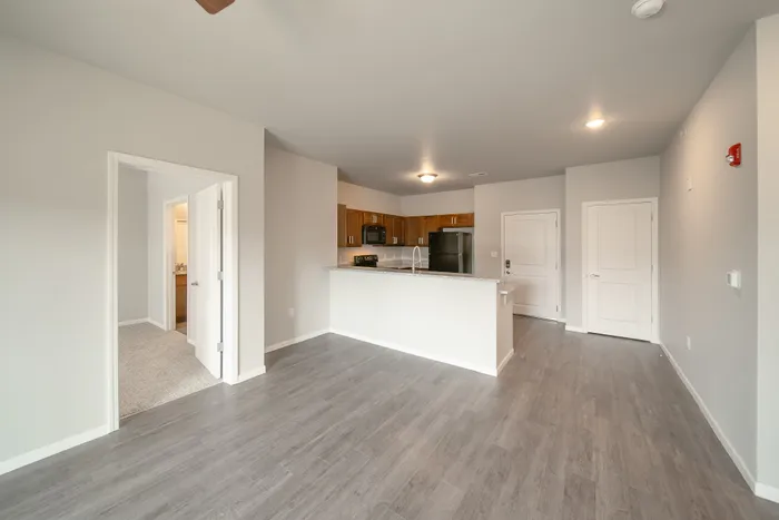 Crescent-Falls-Apartments-Joplin-Missouri-Two-Bedroom-Living-Room-Kitchen