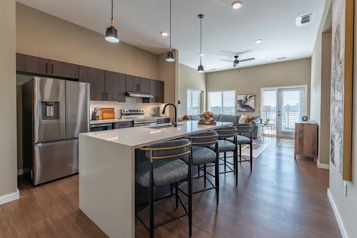 Heritage-Apartments-Springfield-Missouri-Luxury-Furnished-Two-Bedroom-Kitchen-Breakfast-Bar-Living-Room