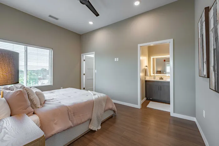 Heritage-Apartments-Springfield-Missouri-Luxury-Furnished-Two-Bedroom-Primary-Bedroom-Bathroom-Entrance