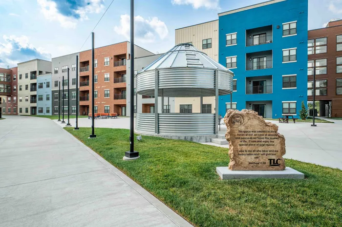 Union-Mill-Apartments-Wichita-Kansas-Luxury-Amenities-Courtyard-Monument-Sign-By-Silo