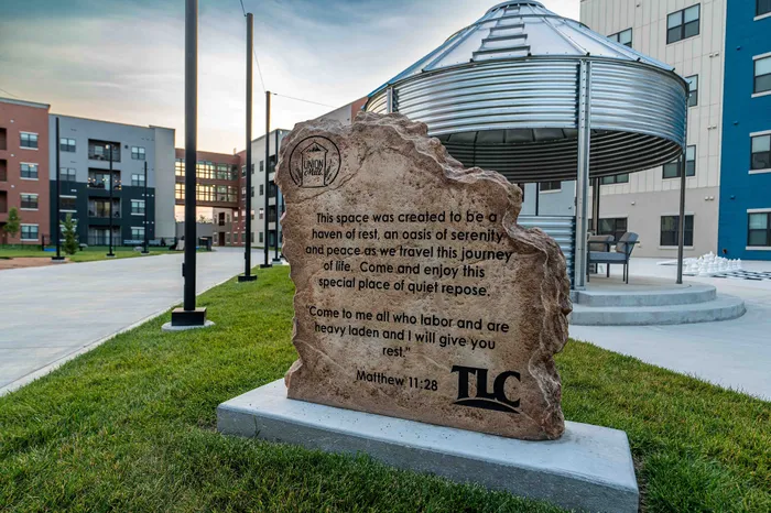 Union-Mill-Apartments-Wichita-Kansas-Luxury-Amenities-Courtyard-Monument-Sign