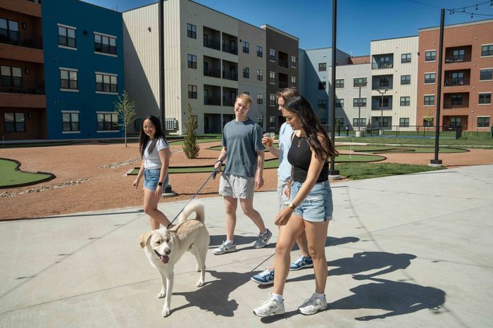 Union-Mill-Apartments-Wichita-Kansas-Luxury-Amenities-Courtyard-Walking-By-Putting-Green