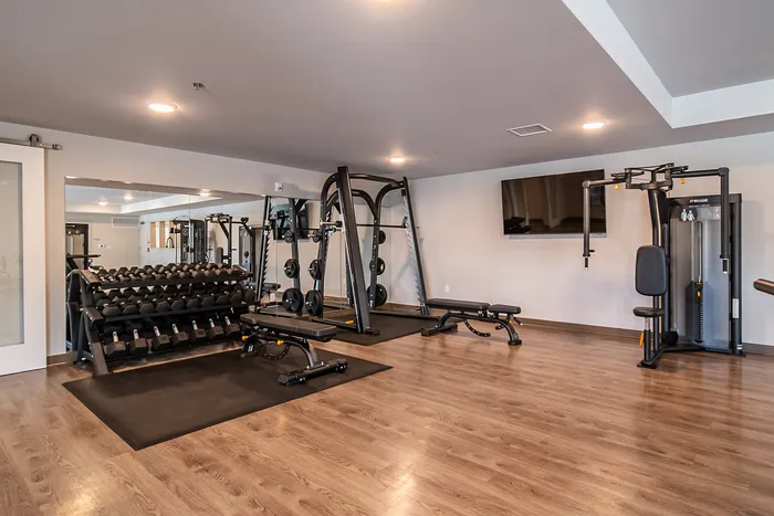 Union-Mill-Apartments-Wichita-Kansas-Luxury-Amenities-Weight-Bench-Dumbbells