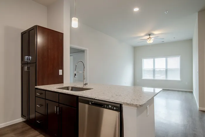 Union-Mill-Apartments-Wichita-Kansas-Two-Bedroom-Deluxe-Kitchen-Living-Room