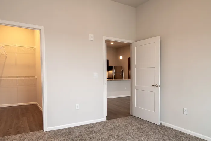 Union-Mill-Apartments-Wichita-Kansas-Two-Bedroom-Deluxe-Guest-Room-Closet-Door