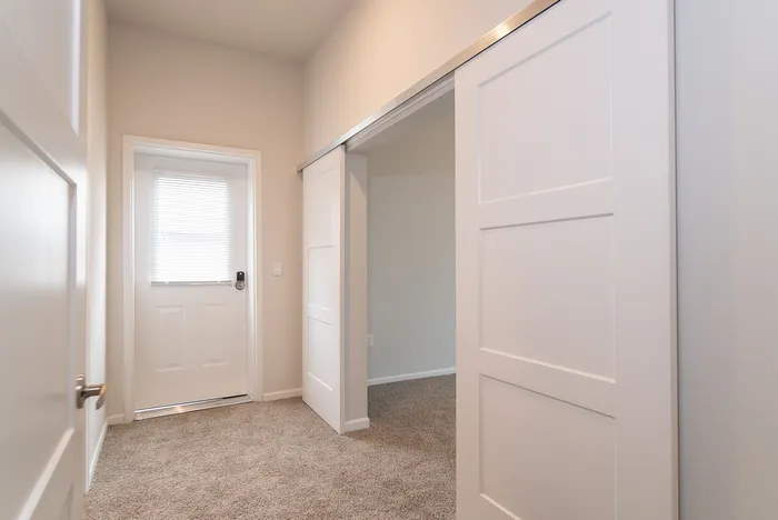 Union-Mill-Apartments-Wichita-Kansas-Two-Bedroom-Deluxe-Hallway-To-Sundeck