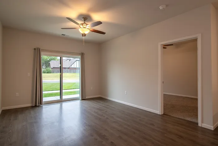 Union-Mill-Apartments-Wichita-Kansas-Three-Bedroom-Living-Room-Patio-View