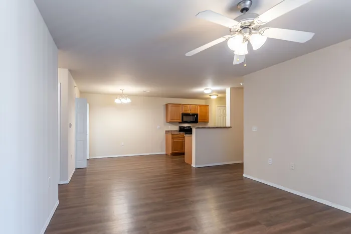 Coryell-Crossing-Apartments-Springfield-Missouri-Four-Bedroom-Living-Room-Dining-Space