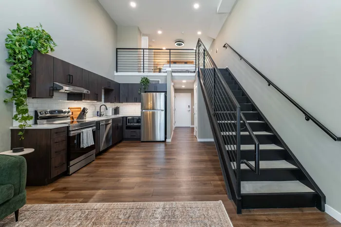 Heritage-Apartments-Springfield-Missouri-Luxury-Homes-Furnished-Studio-Loft-Kitchen-Staircase-To-Loft