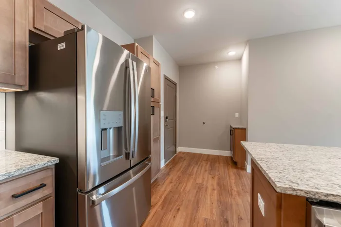 Township-28-Apartments-Springfield-Missouri-Building-H-Three-Bedroom-B-Front-Door-Kitchen-View