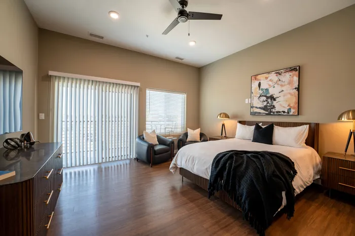 Heritage-Apartments-Springfield-Missouri-Furnished-Studio-Apartment-319-Living-Space-Patio-Doors
