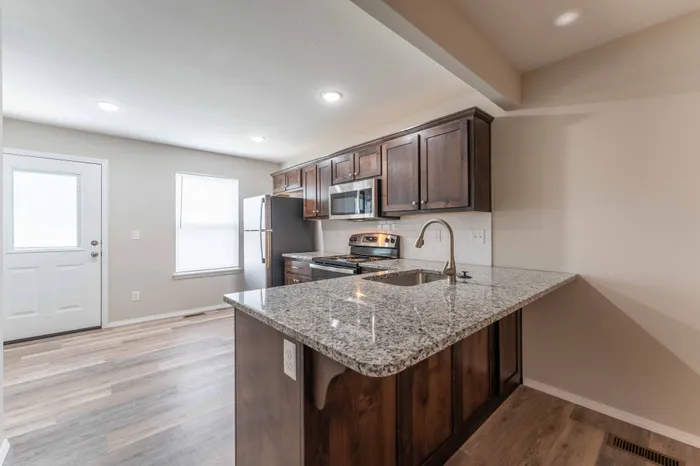 Oakwood-Heights-Townhomes-Republic-Missouri-Two-Bedroom-Home-Kitchen-And-Back-Door