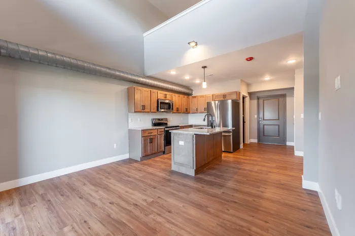 Township-28-Apartments-Springfield-Missouri-Building-H-One-Bedroom-Loft-Premium-Living-Space-And-Kitchen