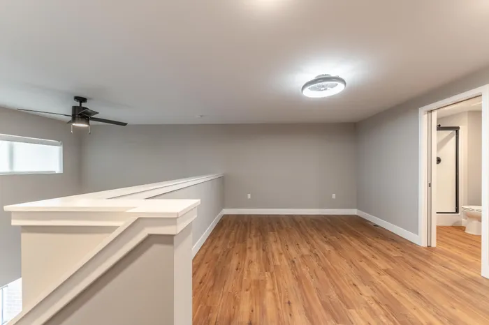 Township-28-Apartments-Springfield-Missouri-Building-H-One-Bedroom-Loft-Premium-Loft-View-From-Staircase