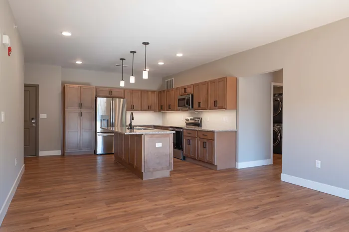 Township-28-Apartments-Springfield-Missouri-Building-H-Premium-Three-Bed-C-Living-Room-And-Kitchen