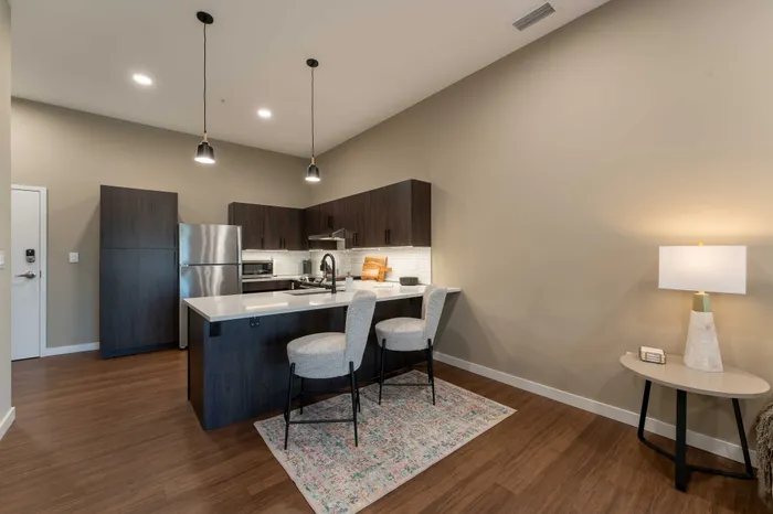 Heritage-Apartments-Springfield-Missouri-Bennett-Furnished-1-Bed-ADA-Unit-Kitchen-Breakfast-Bar