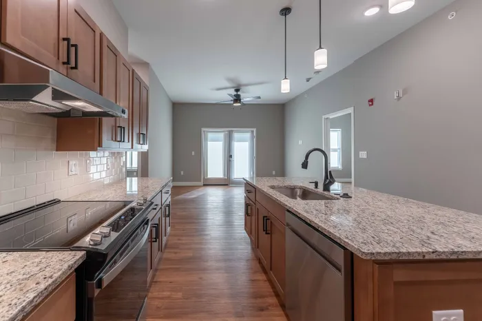Township-28-Apartments-Springfield-Missouri-Building-H-Premium-Two-Bed-ADA-Unit-Ktichen-Living-Room-View