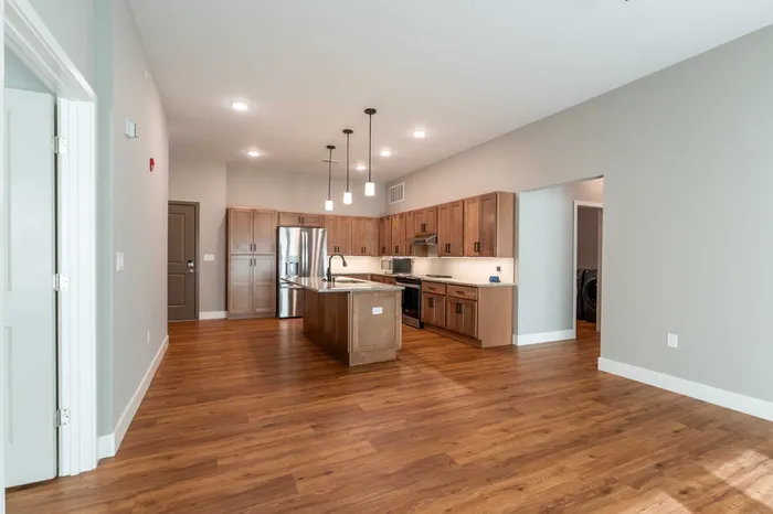Township-28-Apartments-Springfield-Missouri-Building-H-Premium-Three-Bed-ADA-Unit-Living-Room-Kitchen-View