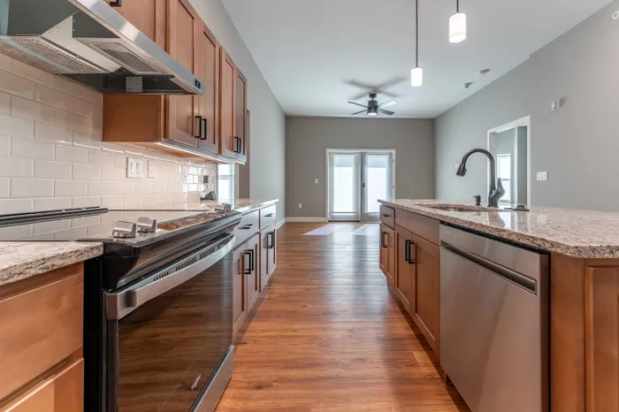Township-28-Apartments-Springfield-Missouri-Building-H-Premium-Three-Bed-ADA-Unit-Living-Room-Kitchen-View