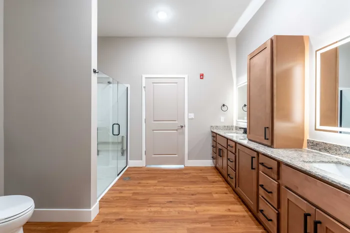 Township-28-Apartments-Springfield-Missouri-Building-H-Premium-Three-Bed-ADA-Unit-Primary-Bathroom-View-From-Closet