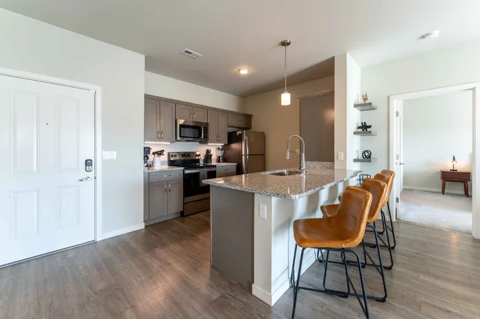 Monarch-Apartments-Springfield-Missouri-Furnished-Two-Bed-Apartment-Kitchen-Breakfast-Bar