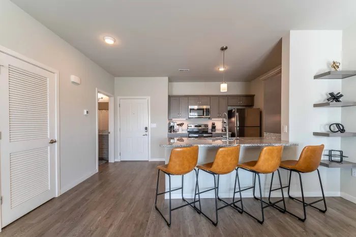Monarch-Apartments-Springfield-Missouri-Furnished-Two-Bed-Apartment-Kitchen-And-Front-Entrance