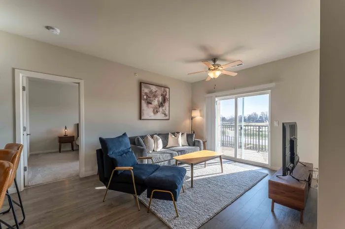 Monarch-Apartments-Springfield-Missouri-Furnished-Two-Bed-Apartment-Living-Room-Patio-Doors