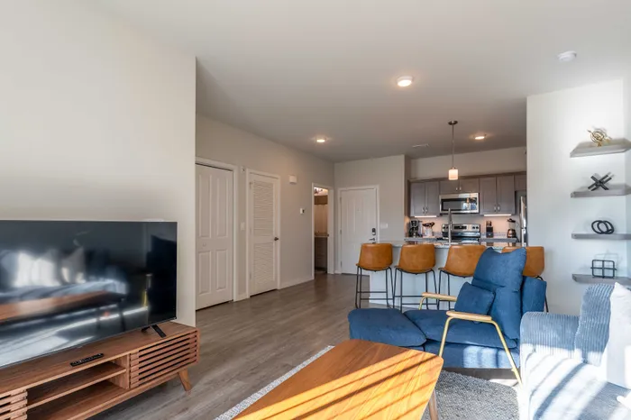 Monarch-Apartments-Springfield-Missouri-Furnished-Two-Bed-Apartment-Living-Room-Kitchen-Open-Layout