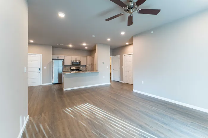Coryell-Commons-Heights-Apartments-For-Rent-South-Springfield-Missouri-Two-Bed-Unit-104-Kitchen-And-Hallway-Living-Room-View