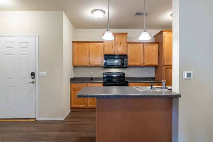 Coryell-Courts-Apartments-North-Springfield-Missouri-Two-Bedroom-Michelle-Phase-1-Kitchen-And-Front-Door