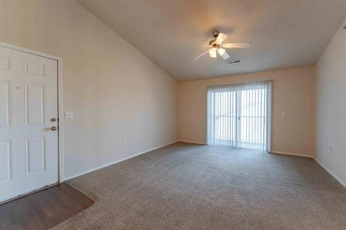 Coryell-Crossing-Apartments-For-Rent-Springfield-Missouri-Three-Bedroom-Living-Room-Patio-Doors