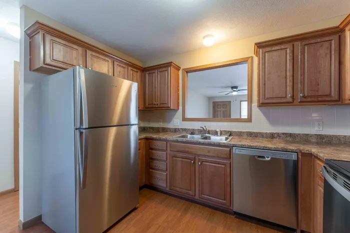 Oakwood-Heights-Townhomes-For-Rent-Republic-Missouri-Phase-1-One-Bedroom-Kitchen-With-Living-Room-Window