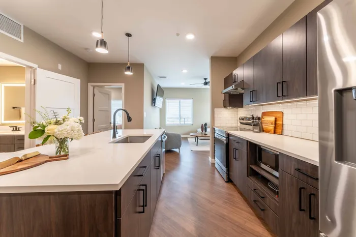 Heritage-Apartments-For-Rent-Springfield-Missouri-Furnished-Two-Bedroom-Unit-401-Kitchen-To-Living-Room-Transition
