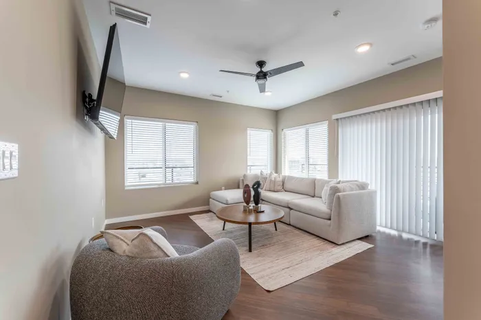 Heritage-Apartments-For-Rent-Springfield-Missouri-Furnished-Two-Bedroom-Unit-401-Living-Room-And-Patio-Doors