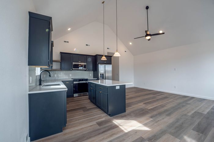 Owen-Silos-Subdivision-Luxury-Homes-South-Springfield-Missouri-Two-Bedroom-Rue-Unit-5683-Kitchen-To-Living-Room