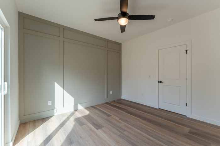 Owen-Silos-Subdivision-Luxury-Homes-South-Springfield-Missouri-Two-Bedroom-Rue-Unit-5683-Primary-Bedroom-Accent-Wall