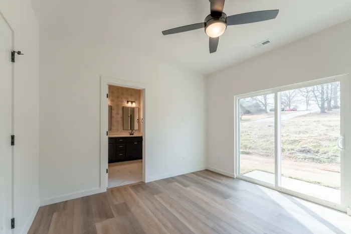 Owen-Silos-Subdivision-Luxury-Homes-South-Springfield-Missouri-Two-Bedroom-Rue-Unit-5683-Primary-Bedroom-Bathroom-Door