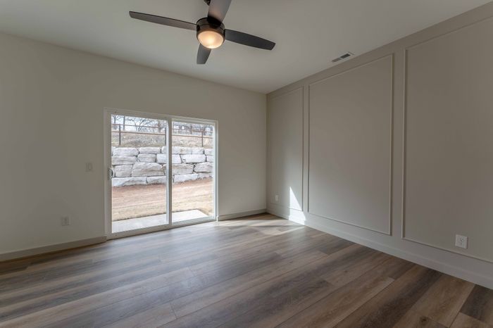 Owen-Silos-Subdivision-Luxury-Homes-South-Springfield-Missouri-Two-Bedroom-Sable-Unit-5717-Primary-Bedroom-Accent-Wall