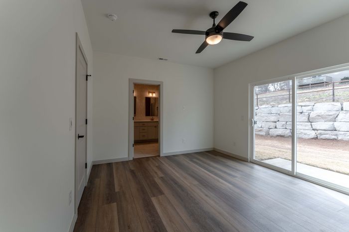 Owen-Silos-Subdivision-Luxury-Homes-South-Springfield-Missouri-Two-Bedroom-Sable-Unit-5717-Primary-Bedroom-And-Patio-Doors