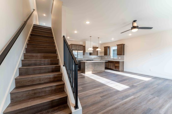 Owen-Silos-Subdivision-Luxury-Homes-South-Springfield-Missouri-Three-Bedroom-Glasford-Unit-5758-Living-Room-And-Staircase-To-Second-Floor