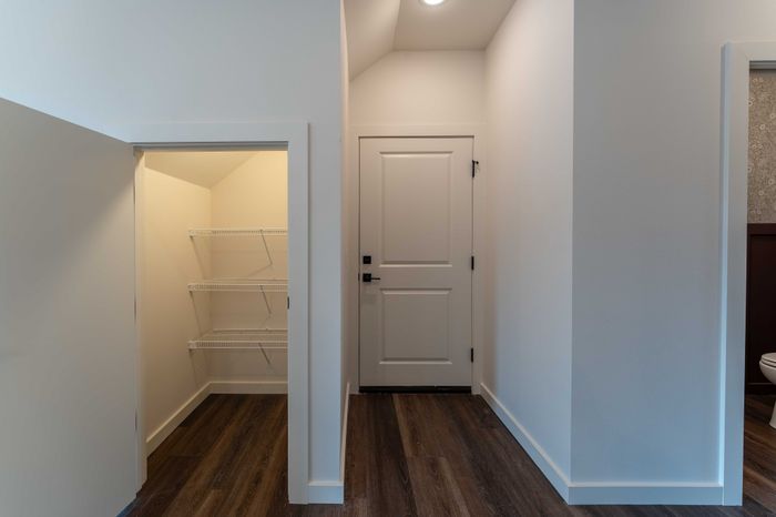 Owen-Silos-Subdivision-Luxury-Homes-South-Springfield-Missouri-Three-Bedroom-Glasford-Unit-5758-Kitchen-Pantry-And-Door-To-Garage