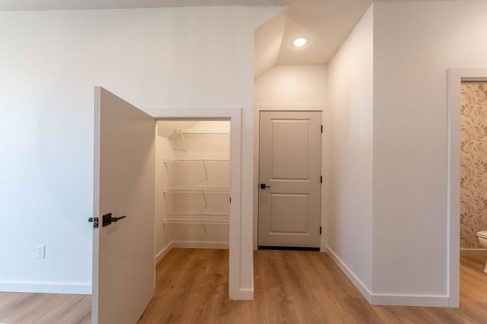 Owen-Silos-Subdivision-Luxury-Homes-South-Springfield-Missouri-Four-Bedroom-Cambridge-Unit-5765-Kitchen-Pantry-And-Door-To-Garage