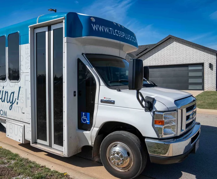 TLC-Properties-Springfield-Missouri-Apartments-For-Rent-Amenity-Shuttle-Bus-Entrance