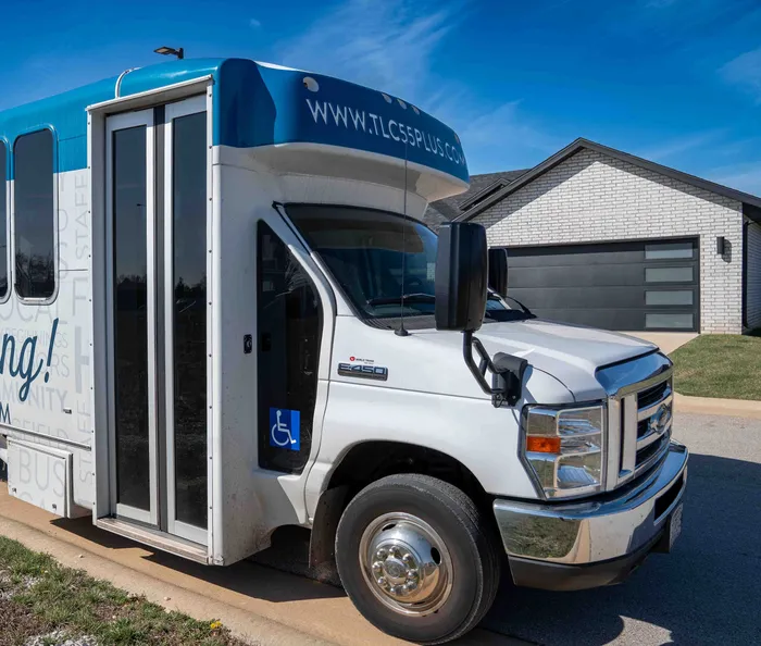 TLC-Properties-Springfield-Missouri-Apartments-For-Rent-Amenity-Shuttle-Bus-Entrance