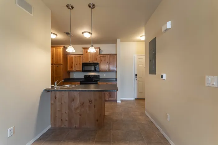 Coryell-Courts-Apartments-North-Springfield-Missouri-Studio-Olivia-Phase-Two-Kitchen-And-Front-Entrance